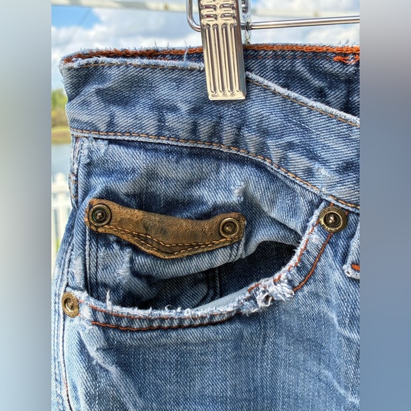 Low Rise Distressed Jeans - Picture 3 of 10